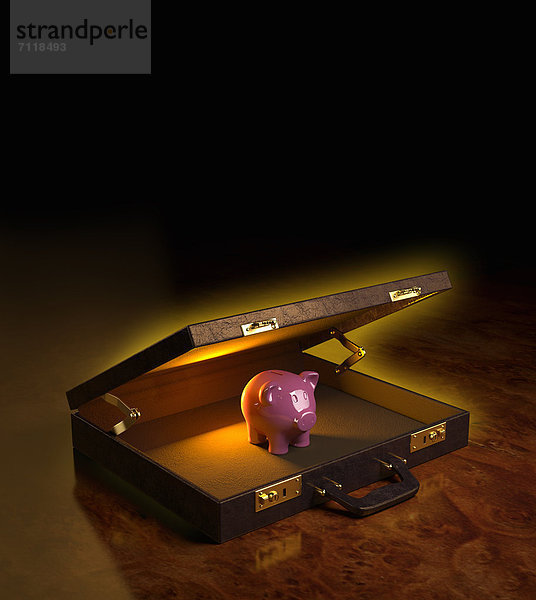 Sparschwein in einem leuchtenden offenen Aktenkoffer