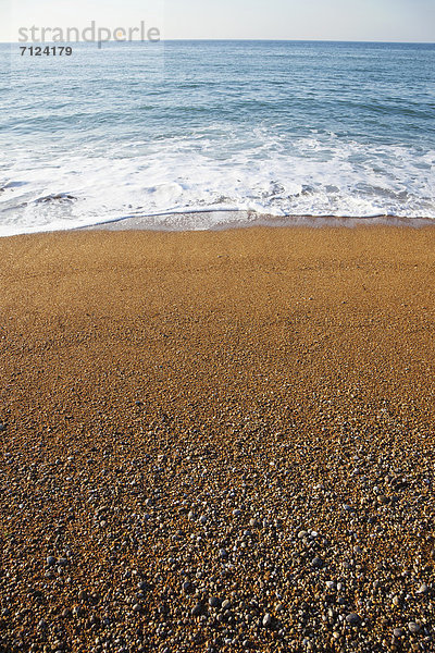 Wasser  Baustelle  Europa  Urlaub  Strand  britisch  Großbritannien  Steilküste  Küste  Reise  Meer  Kieselstein  Küstenlinie  UNESCO-Welterbe  Lulworth Cove  Durdle Door  Dorset  England  Tourismus