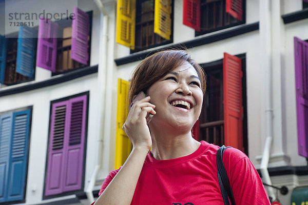Handy  Kommunikation  Urlaub  Reise  Kurznachricht  Asien  Singapur  Tourismus