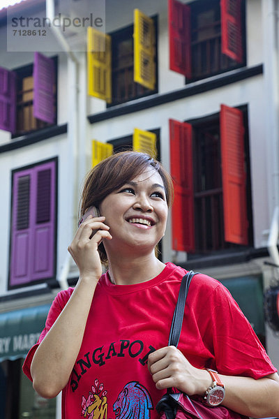 Handy  Kommunikation  Urlaub  Reise  Kurznachricht  Asien  Singapur  Tourismus