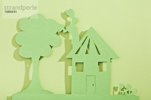 Papierschnitte aus Haus und Baum