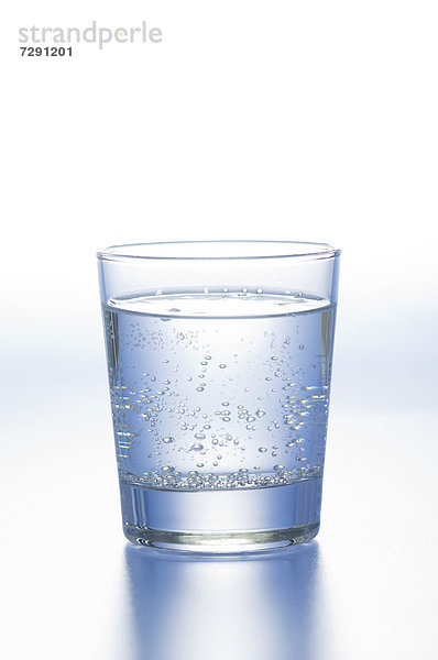 Glass of water on white background