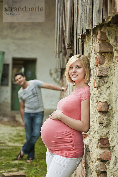 Schwangere Frau mit ihrem Mann