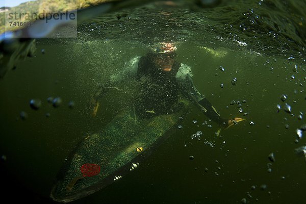 Mann  Unterwasseraufnahme  Blase  Blasen  Kajak  Ansicht  Trennung  1