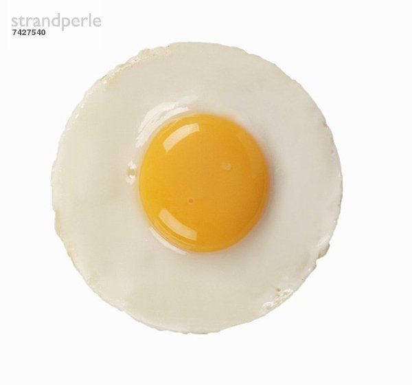 A fried egg  seen from above