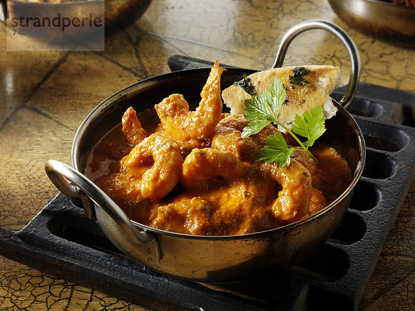 Makhani-Curry mit Garnelen und Reis  indische Küche
