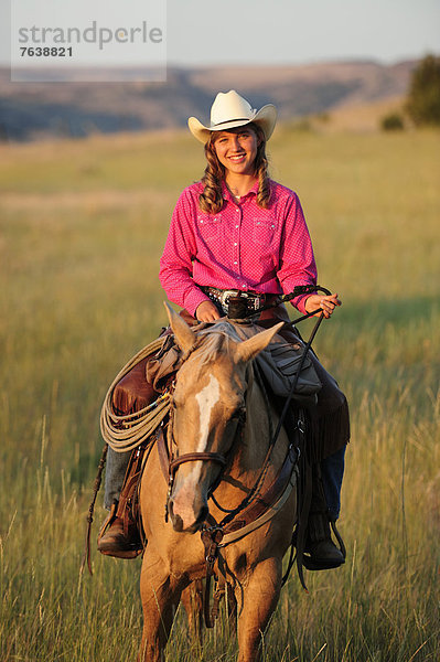 Vereinigte Staaten von Amerika  USA  Frau  Sport  Amerika  Hut  reiten - Pferd  Mädchen  Cowgirl  Oregon  Ranch