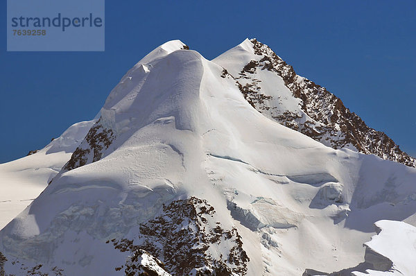 Berggipfel  Gipfel  Spitze  Spitzen  bedecken  sehen  über  Zwilling - Person  Eis  Alpen  Breithorn  Zermatt