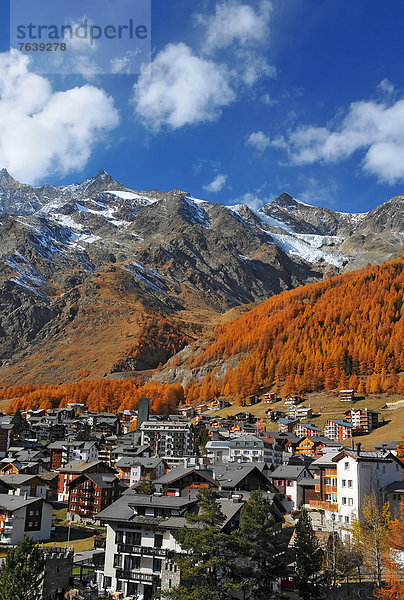 Zusammenhalt  Wahrzeichen  Skisport  Urlaub  Ski  Sonnenlicht  Berggipfel  Gipfel  Spitze  Spitzen  Klima  rund  schweizerisch  Jahr