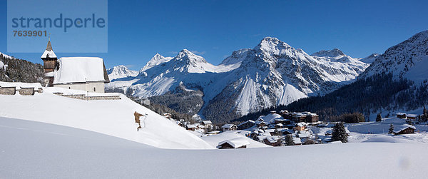 Panorama Europa Berg Winter Kirche Religion Kanton Graubünden Arosa Schweiz