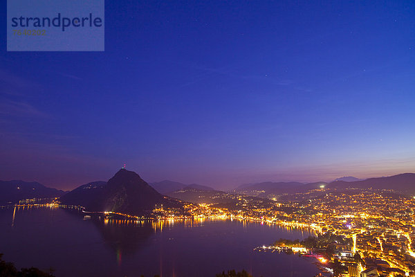 Europa Dunkelheit Nacht Stadt Großstadt See Beleuchtung Licht Lugano Schweiz bei Nacht