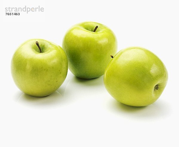 Drei Äpfel der Sorte Granny Smith