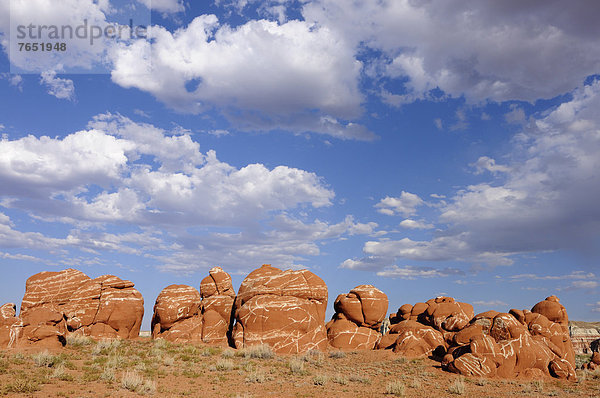 Sandstone boulders  sandstone formations  with cumulus clouds