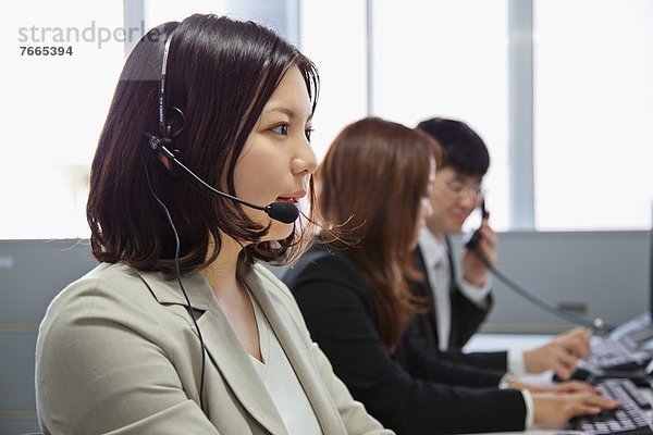 Geschäftsfrau  Business Frau mit Headset