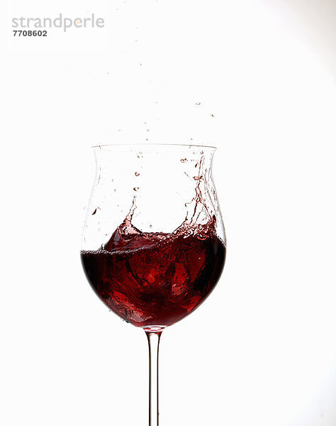 Weinspritzen im Glas