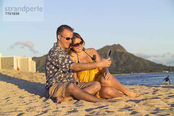 sitzend  Fotografie  nehmen  Strand  Hintergrund  Fotohandy  Diamant  Hawaii  Oahu  Waikiki Beach
