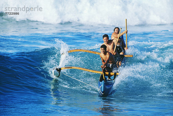 frontal  Mann  Kanu  3  Hawaii  Oahu  Wellenreiten  surfen  Wasserwelle  Welle