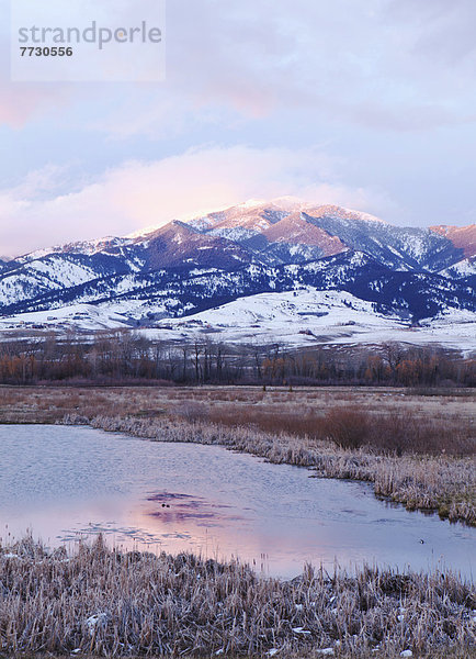 Wasser  Berg  bedecken  Sonnenuntergang  Spiegelung  Yellowstone Nationalpark  Schnee