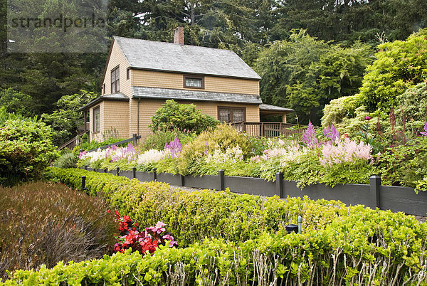Old House And Flower Gardens  Oregon United States Of America