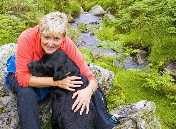 A Woman With Her Dog  Ullswater Cumbria England