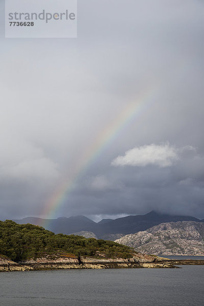 Rainbow In The Cloudy Sky  Applecross Peninsula Scotland