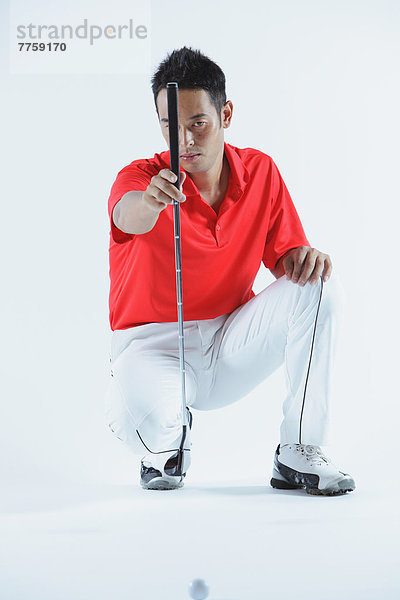 Golfer Preparing
