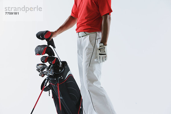 Golfer with Golf-Club Bag  Low-Section