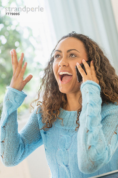 Young woman talking on phone