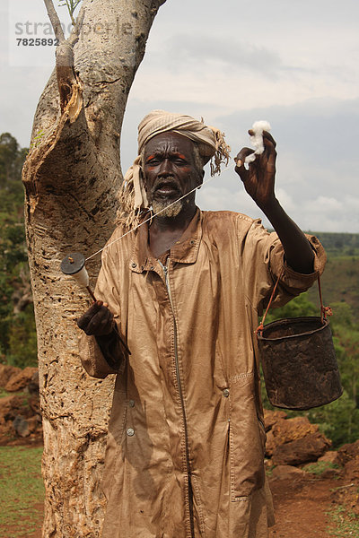 Portrait  Mann  Tradition  herumwirbeln  Ethnisches Erscheinungsbild  Gesichtsbemalung  Afrika  Äthiopien  alt  Spindel  Volksstamm  Stamm