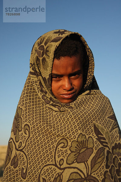 frontal  Gebirge  Nationalpark  Portrait  Berg  Junge - Person  Abend  Landschaft  Abenddämmerung  UNESCO-Welterbe  Semien  Afrika  Äthiopien  Highlands  Gebirgszug  Schafhirte  trekking