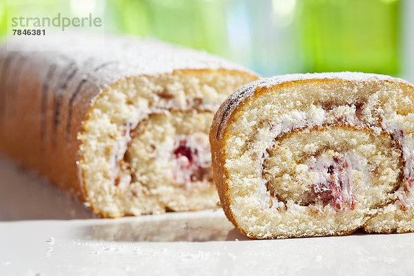 Raspberry roll sponge cake  close up
