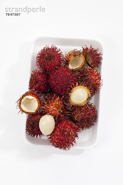 Rambutan-Früchte auf Tablett