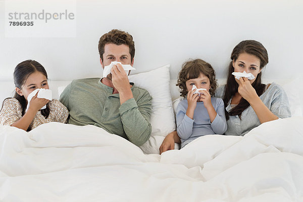 Familie mit Erkältung