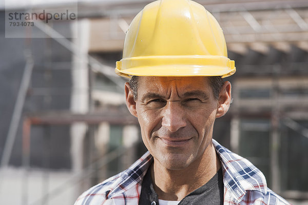 Bauarbeiter auf einer Baustelle  Portrait