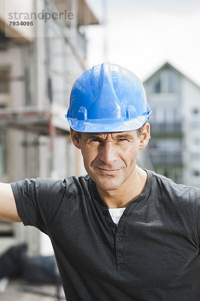 Bauarbeiter auf einer Baustelle  Portrait