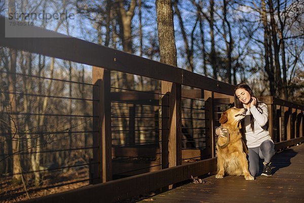 Frau  kniend  rennen  Hund  jung