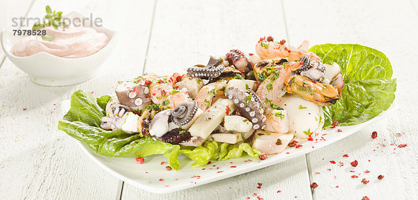 Octopus salad with cocktail sauce