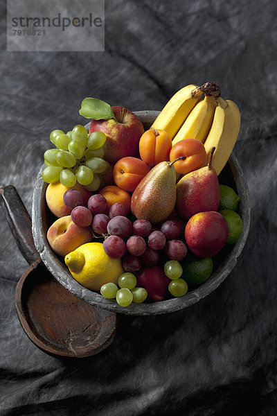 Varieties of fruits in fruit bowl  close up