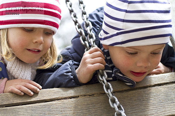 Girl and boy in playground