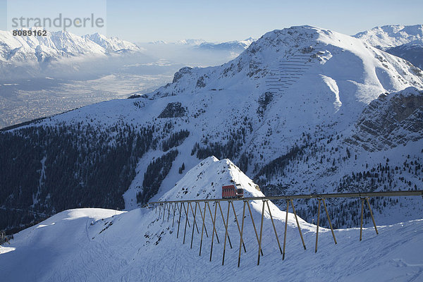 Olympic mountain railway Axamer Lizum  Innsbruck at back