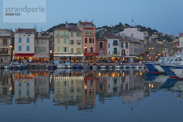 Harbour and historic town centre  street cafes and restaurants  evening mood