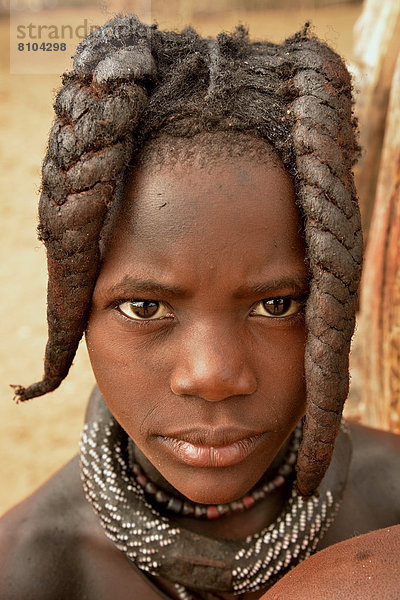 Himba-Mädchen mit typischer Haartracht