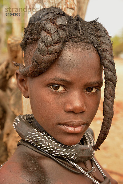 Himba-Mädchen mit typischer Haartracht