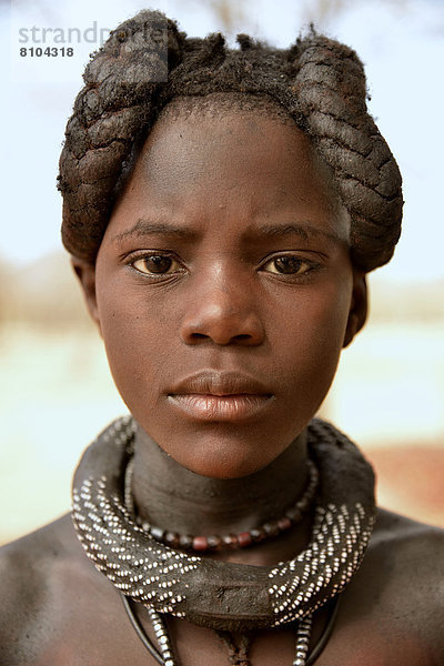 Himba-Mädchen mit typischer Haartracht