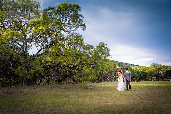 USA  Texas  Bride and groom at wedding ceremony