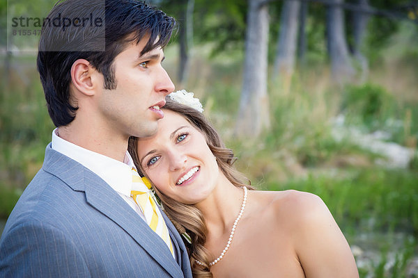 USA  Texas  Portrait of Bride while groom looking away