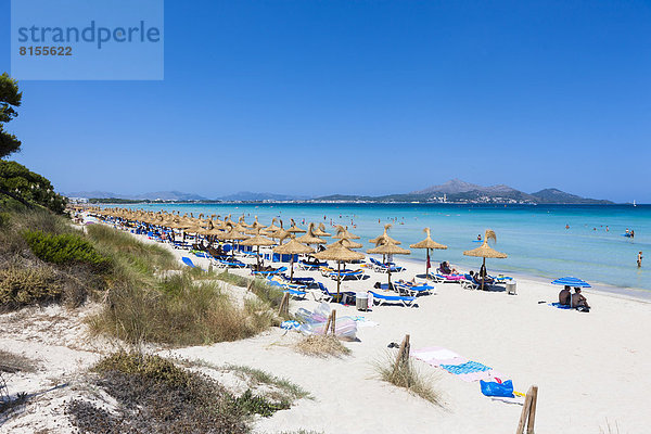 Spain  Mallorca  View of tourists in Playa de Muro beach