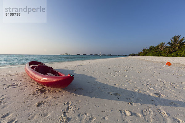 Maldives  Canoe on beach at Island