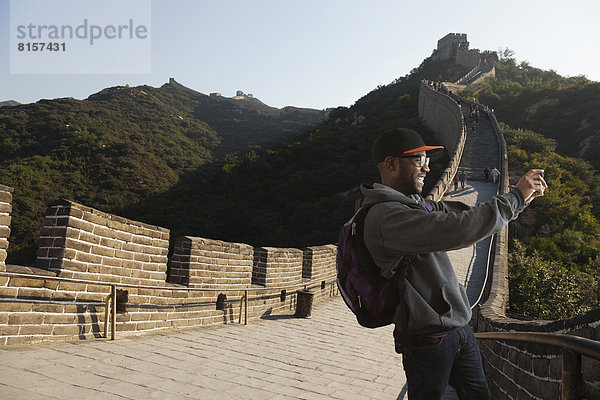 Mann  Fotografie  nehmen  Wand  schwarz  Peking  Hauptstadt  groß  großes  großer  große  großen  China