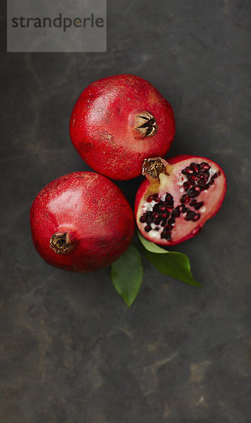 Pomegranates with leaf  close up